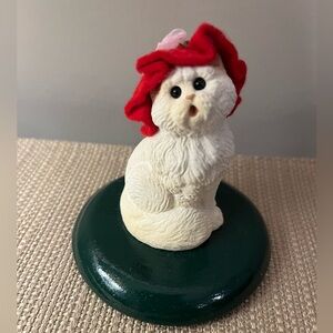 Byers Choice Carolers 2004 Cat. Wearing red hat with pink rose. Great condition.